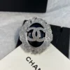 Chanel leather brooch