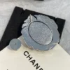 Chanel leather brooch