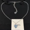 Chanel blue heart necklace