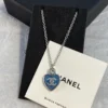 Chanel blue heart necklace