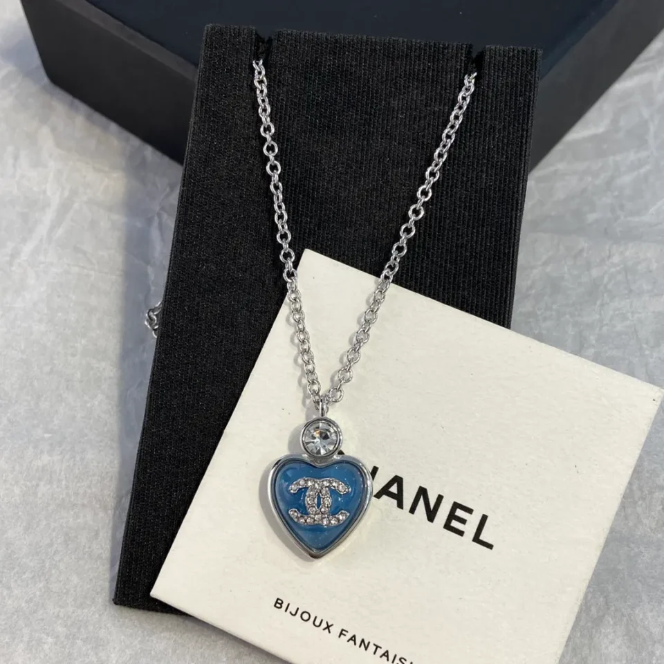 Chanel blue heart necklace