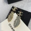 CHANEL feather shape earrings
