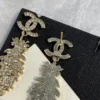 CHANEL feather shape earrings