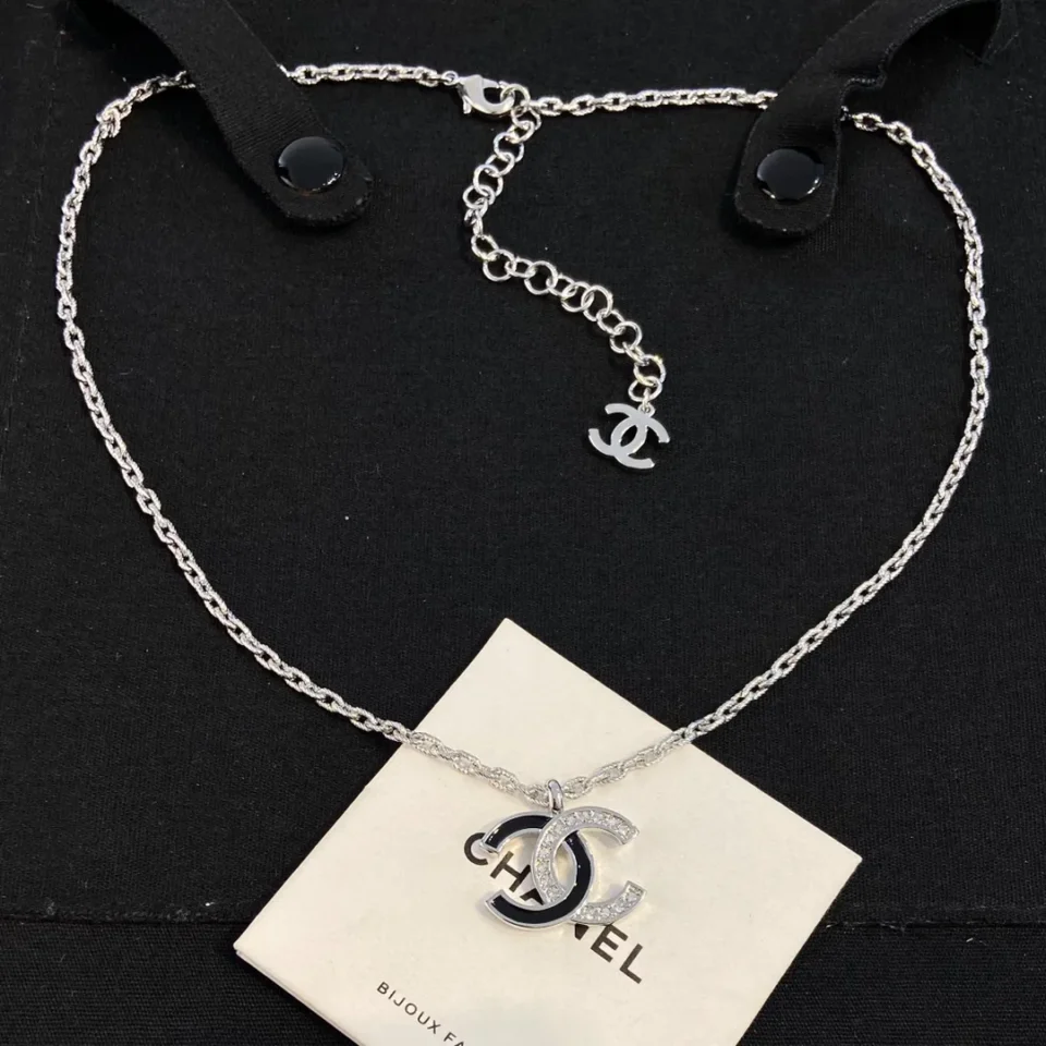 CHANEL black enamel CC-shaped pendant