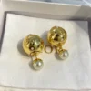 DIOR Golden Sphere Earrings