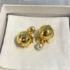 DIOR Golden Sphere Earrings