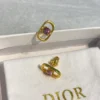 Petit CD Jolie Mini Stud Earrings