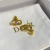 Petit CD Jolie Mini Stud Earrings