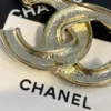 CHANEL star brooch