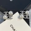 CHANEL logo studs