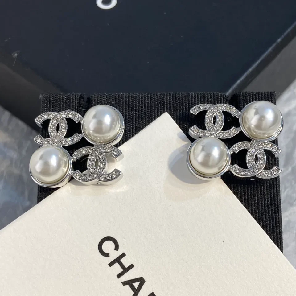 CHANEL logo studs