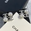 CHANEL logo studs