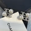 CHANEL logo studs