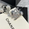 CHANEL logo studs