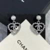 Chanel heart shape earrings , golden/silver
