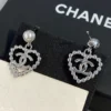 Chanel heart shape earrings , golden/silver