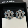 CHANEL crystal snowflake earrings