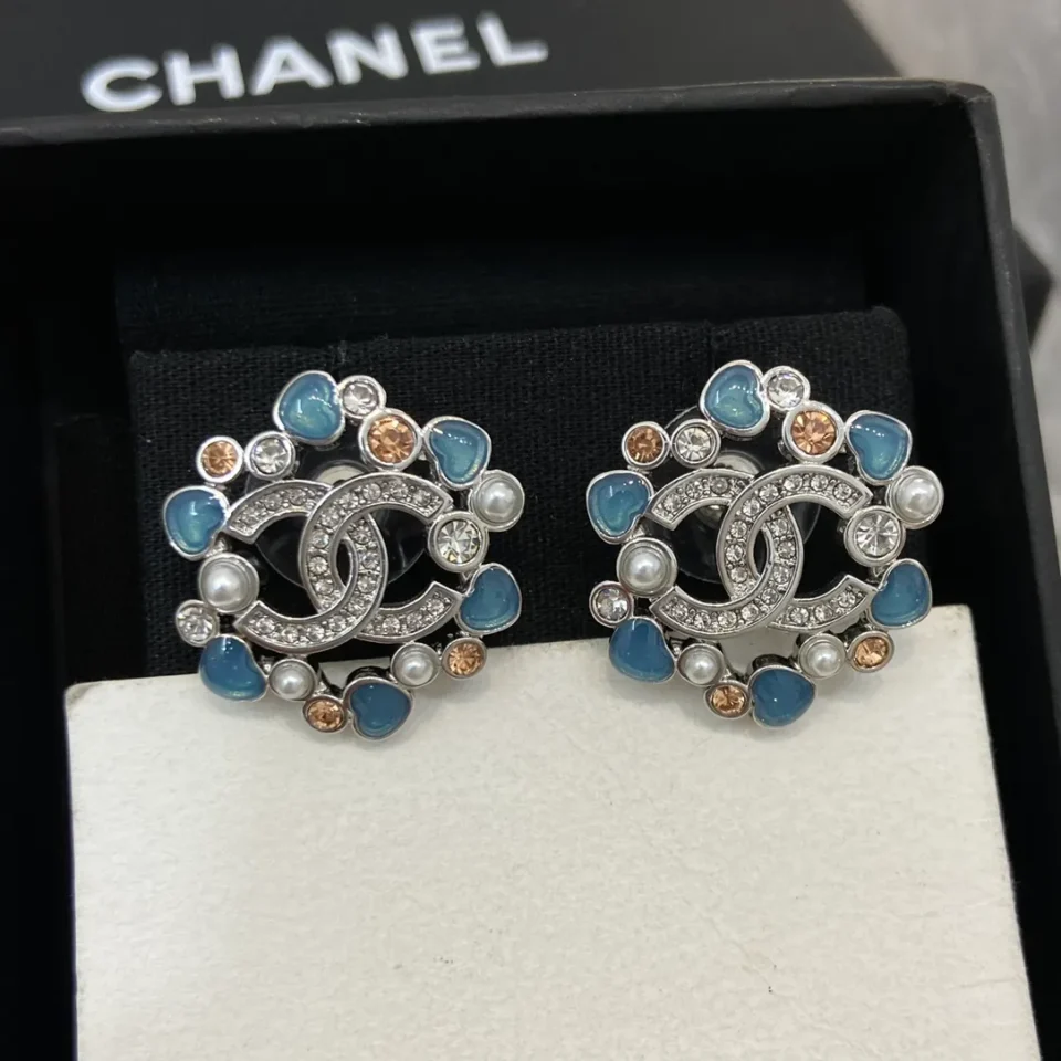 CHANEL crystal snowflake earrings
