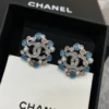 CHANEL crystal snowflake earrings