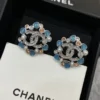 CHANEL crystal snowflake earrings