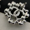 CHANEL crystal snowflake earrings