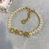 Dio(r)evolution pearl bracelet with logo