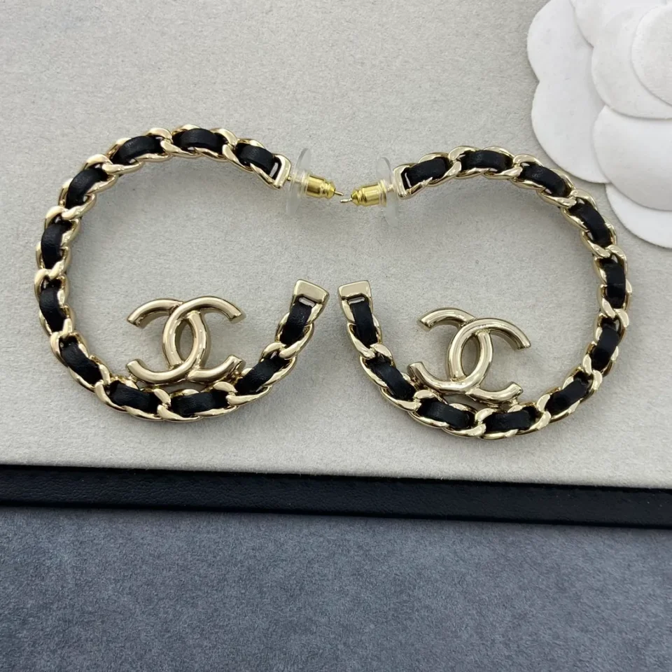 CHANEL leather half-circle earrings