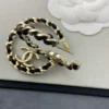 CHANEL leather half-circle earrings