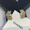 CHANEL feather shape studs