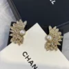 CHANEL feather shape studs