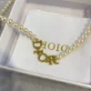 Dio(r)evolution Necklace Pearl logo necklace