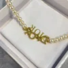Dio(r)evolution Necklace Pearl logo necklace