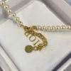 Dio(r)evolution Necklace Pearl logo necklace