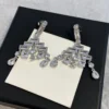 CHANEL Cascading drop pedant earrings