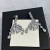 CHANEL Cascading drop pedant earrings