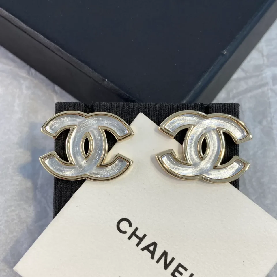 Chanel white iridescent stud earrings