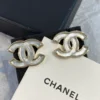 Chanel white iridescent stud earrings
