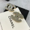 Chanel white iridescent stud earrings