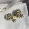 Dior pearl ear studs