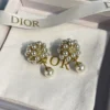 Dior pearl ear studs