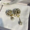 Dior pearl ear studs
