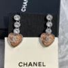 CHANEL pink heart earrings