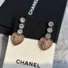 CHANEL pink heart earrings