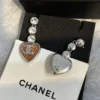 CHANEL pink heart earrings
