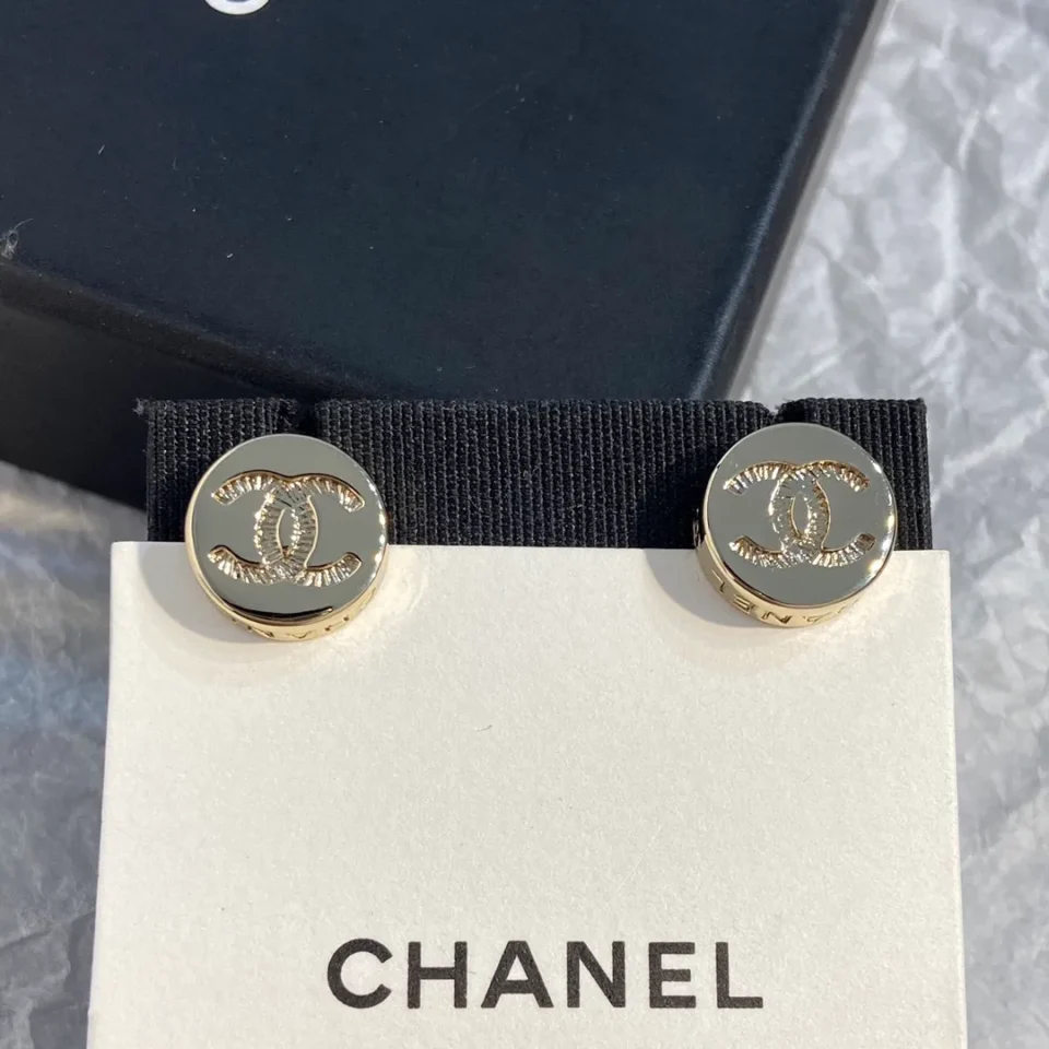 Chanel button ear studs
