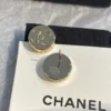 Chanel button ear studs