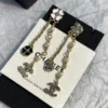 CHANEL Clover Earrings ,black and white