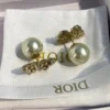 Dior hollow butterfly shape earrings