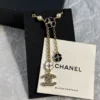 Chanel black and white four-leaf clover enamel necklace