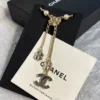 Chanel black and white four-leaf clover enamel necklace